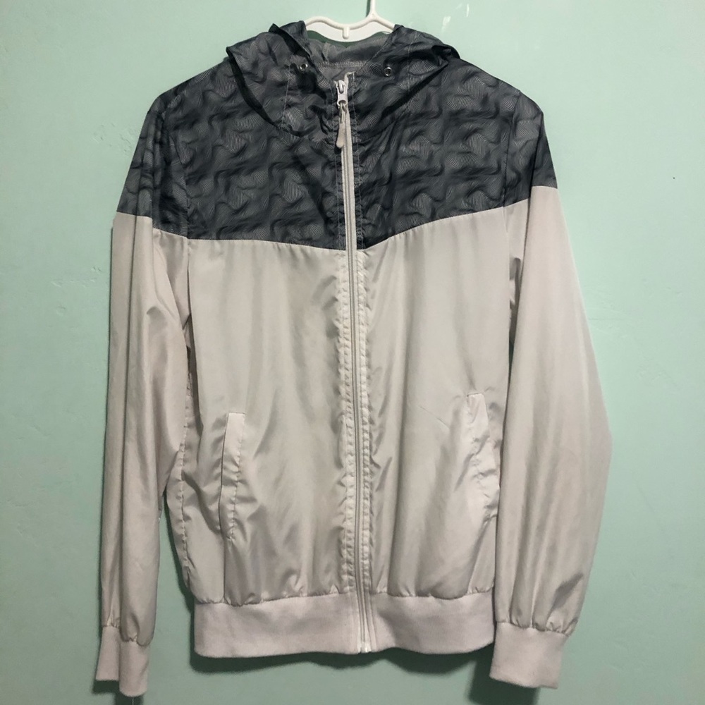 Thin white and grey jacket
